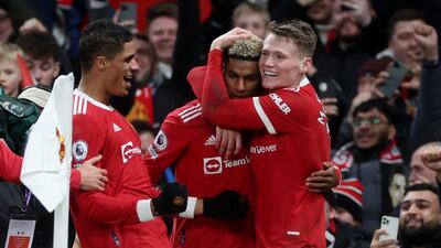 Manchester United's Marcus Rashford celebrates with Raphael Varane and Scott McTominay after scoring the winner against West Ham at Old Trafford on Saturday, January 22, 2022. Reuters