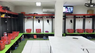 Deportivo Palestino's changing room, painted in the colours of the Palestinian flags in keeping with the stadium's theme. Juman Jarallah / The National 