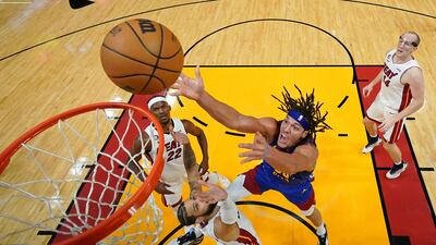 Denver Nuggets forward Aaron Gordon shoots, under pressure from Miami Heat's Caleb Martin at Kaseya Centre, Miami. Reuters