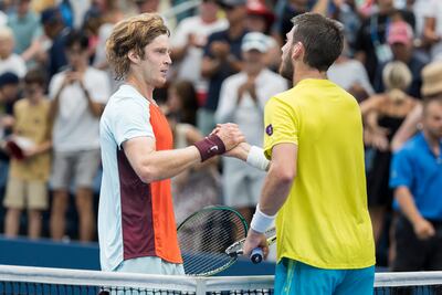 Andrey Rublev greets Cameron Norrie at the net after his straight sets win to reach the US Open quarterfinals. EPA