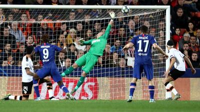 Valencia's Jasper Cillessen saves a shot from Chelsea striker Tammy Abraham. Reuters