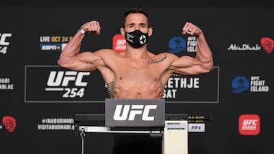 Michael Chandler poses on the scale during the UFC 254 weigh-in in October 2020 on UFC Fight Island, Abu Dhabi. Josh Hedges/Zuffa LLC
