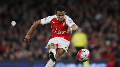 Arsenal’s Alexis Sanchez scores the second goal with a free kick. Paul Childs / Reuters