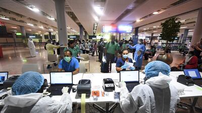 Members of an Indian medical team arrive at Dubai International Airport to help with the coronavirus (COVID-19) pandemic. AFP
