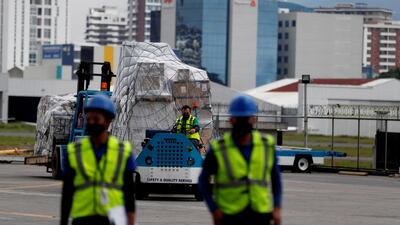 Genuine Covid-19 vaccine doses are unloaded from a plane in Guatemala. EPA