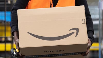 Companies are working around the clock to cope with a surge in online orders. Sebastian Kahnert / Getty Images