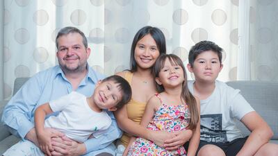 Fabrice Vallotton, left, and his wife, Lea, with their three children. Courtesy Zoybuckz Captures