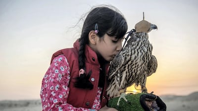 Osha Al Mansoori was introduced to a falcon for the first time when she was just six months old. Vidhyaa Chandramohan for The National