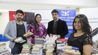 Maha Khan, founder of the Kitaabie initiative, second left, says the process of registration is under way. Antonie Robertson / The National