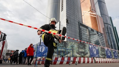 An emergency cordon set up around a building in Moscow damaged by a drone attack on August 23. EPA