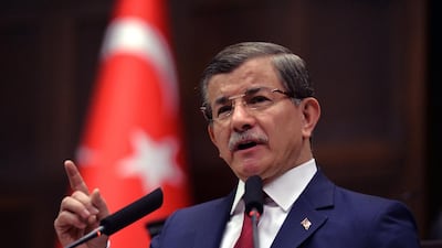 Turkish prime minister Ahmet Davutoglu addresses lawmakers at the parliament in Ankara on May 3, 2016. AP Photo