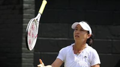 Zheng Jie, suffers an early exit from SW19.