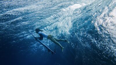Australian surfer Molly Picklum training for the Olympic Games, on the French Polynesian island of Tahiti. Getty Images