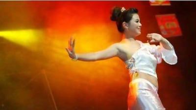 A dancer performs a traditional dance during local Chinese New Year celebrations at the Boracay Night Club in the Asiana Hotel in Deira. Antonie Robertson / The National
