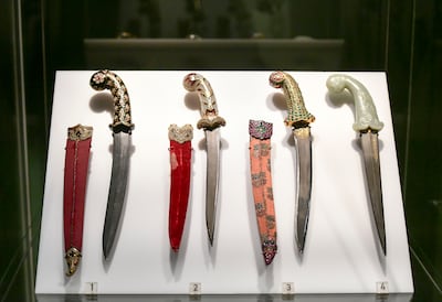 Various daggers and scabbards on display at the Ziena Splendor of the Indian Courts exhibition at Sharjah Museum of Islamic Civilization, Sharjah. Khushnum Bhandari / The National
