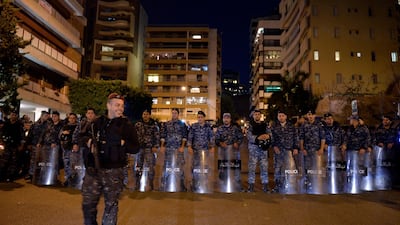 Lebanese riot police stand guard outside the residence of the Lebanese designated Prime Minister Hassan Diab in Beirut. EPA