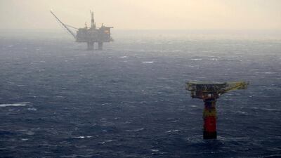 The Statfjord A platform (background) and the loading buoy (foreground right), in the North Sea. Rig activity there has tumbled. Hommedal Marit / AFP