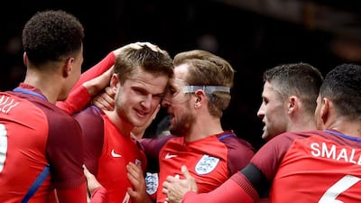Eric Dier (2nd L) of England celebrates with teammates after scoring the winning goal during the international friendly soccer match between Germany and England in Berlin, Germany, 26 March 2016. EPA/ANNEGRET HILSE