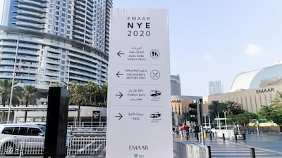 Signs directing crowds to Downtown Dubai NYE’s celebrations. Reem Mohammed / The National