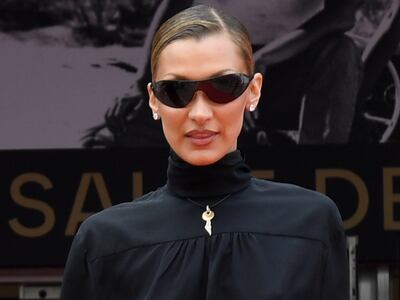 Palestinian-American model Bella Hadid pairs Tom Ford with a key necklace at the 2026 Cannes Film Festival. Getty Images