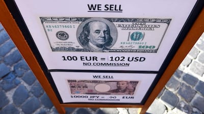 Above, a currency bureau in Rome advertises the day's exchange rates. Chris Ratcliffe / Bloomberg