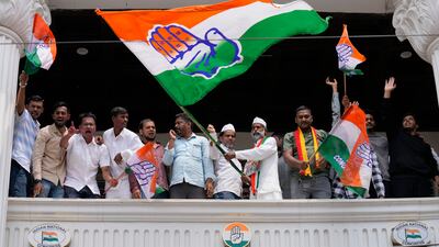 Congress supporters celebrate after early vote counts showed their party was on course to win elections in India's Karnataka state. AP