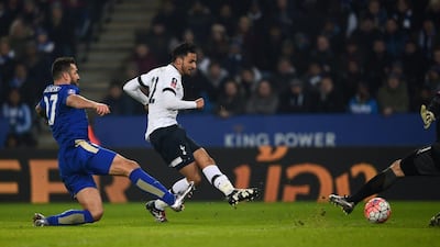 Nacer Chadli of Tottenham Hotspur shoots and scores their second goal against Leicester City. Laurence Griffiths / Getty Images