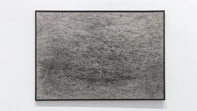 Minam Apang's painting at the Surface Tension exhibition. Photo by Reem Mohammed/The National