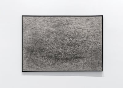 Minam Apang's painting at the Surface Tension exhibition. Photo by Reem Mohammed/The National