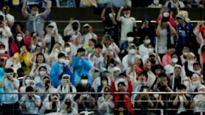 Team K League's Lars Veldwljk celebrates scoring their second goal with teammates. Reuters