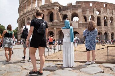 The revival in tourism was partly credited to good weather, with visitors seen here at the Colosseum in Rome. Getty