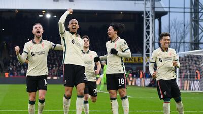 Fabinho, second left, celebrates after scoring Liverpool's third goal. Getty