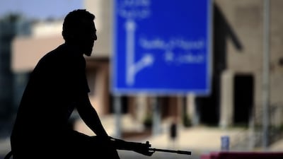 A rebel fighter is pictured in Tripoli, on August 23, 2011. Libyan rebels declared the Kadhafi era over after storming Tripoli. AFP PHOTO/FILIPPO MONTEFORTE