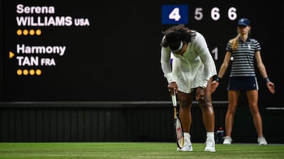 Serena Williams reacts as she plays against France's Harmony Tan. AFP