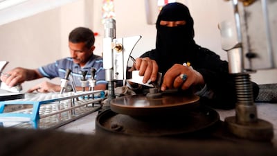 Safa al-Faqih crafts a stone in the old city of the capital, Sanaa, on April 18, 2018. Mohammed Huwais / AFP Photo