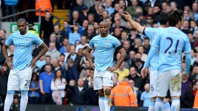 Manchester City midfielder Vincent Kompany and his teammates hope they can still chase Liverpool, who took a giant stride towards their first English championship of the Premier League era with a thrilling 3-2 win over title rivals Manchester City on Sunday. AFP PHOTO/ANDREW YATES