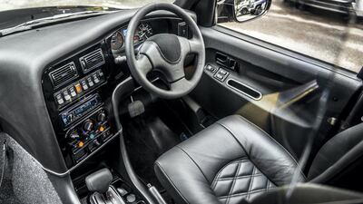 A leather-trimmed steering wheel is among the luxurious interior touches. Kahn Design