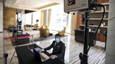 Thermal scanners at the entrance of Marriot Hotel Downtown, Abu Dhabi. Victor Besa / The National