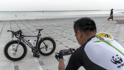 A man takes a break from cycling on the new cycle track. Antonie Robertson / The National