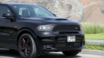 The '392' logo above the front wheel arches denotes the engine's cubic-inch – or 6.4 litres. Chris Whiteoak / The National