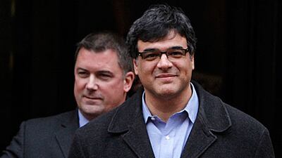 Former CIA officer John Kiriakou, right, leaves the Federal Court in Virginia yesterday.