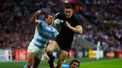 Sonny Bill Williams, centre, of the New Zealand All Blacks evades a challenge from Juan Imhoff, left, and Nicolas Sanchez of Argentina during a 2015 Rugby World Cup Pool C match. Getty Images