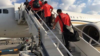Al Ahli players board the plane ahead of their flight to China. ©Twitter / @AlAhliClub