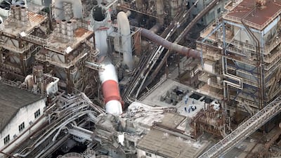 A collapsed chimney at Nippon Paper Industries' Yatsushiro Mill. Reuters