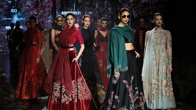 Embroidered creations by designer duo Shyamal and Bhumika. Rajat Gupta / EPA
