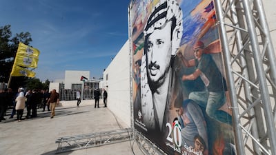 Fatah members commemorating the 20th anniversary of the death of Palestinian leader Yasser Arafat, in Ramallah, in the occupied West Bank. EPA