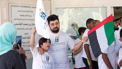Participants at the Special Olympics Torch Run at Al Thiqah Club for Handicapped. Leslie Pableo for The National