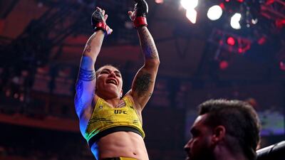 Jessica Andrade celebrates beating Mackenzie Dern at UFC 295. USA Today