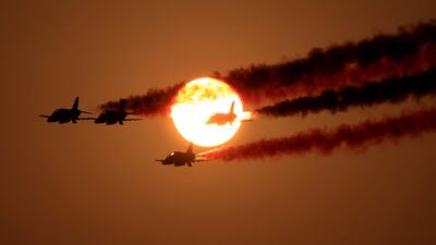 Jets release smoke as they perform an air display over the Jeddah Corniche Circuit. AFP