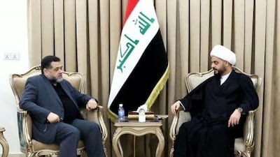 Senior Hamas leader Osama Hamdan, left, meets Qais Al Khazali, leader of Iran-backed Shiite militia Asaib Ahl Al Haq, in Baghdad. Photo: AAH